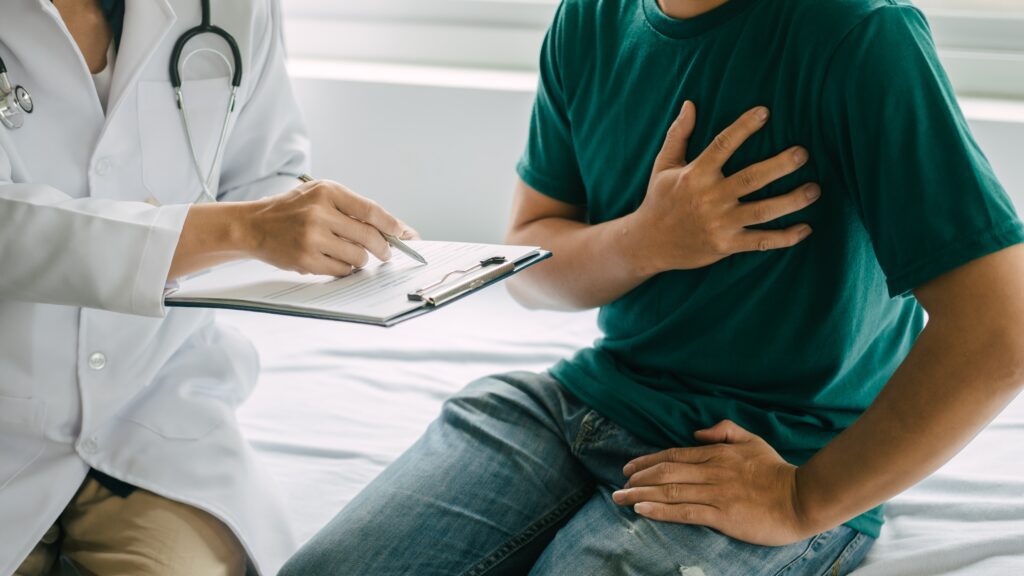 man seeing a doctor about heart health